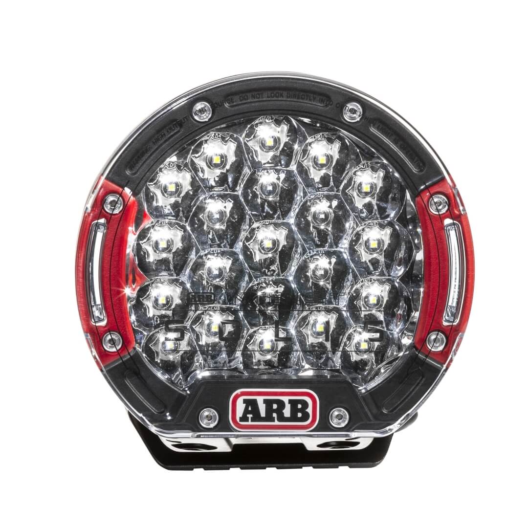 ARB Solis 21 Spot Driving Light front facing image with red bezels